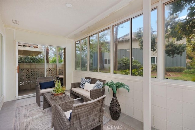 sunroom / solarium featuring visible vents