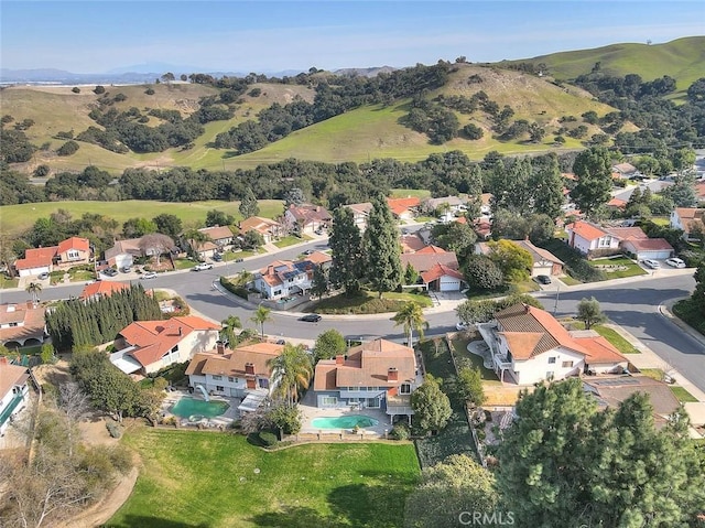 bird's eye view with a mountain view and a residential view