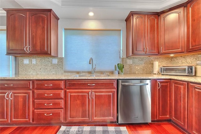 kitchen featuring a toaster, dark wood finished floors, a sink, dark brown cabinets, and dishwasher