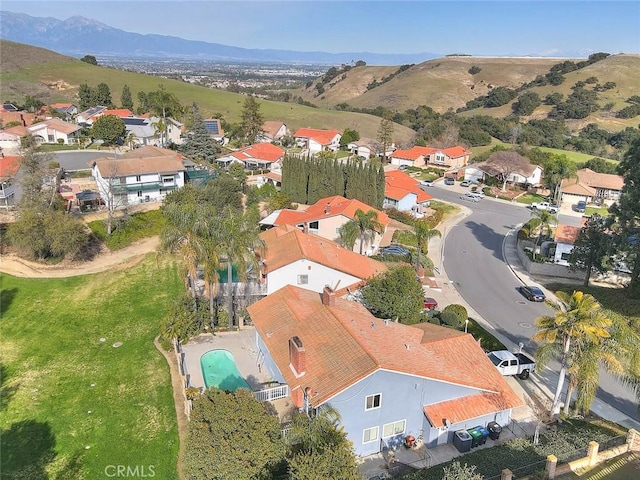 drone / aerial view with a mountain view and a residential view