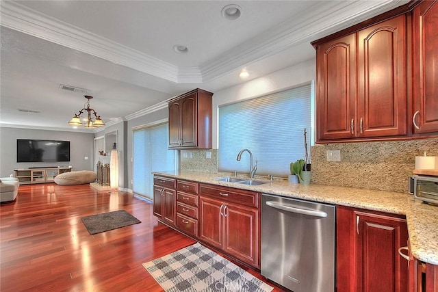 kitchen featuring dark wood-style flooring, crown molding, visible vents, stainless steel dishwasher, and a sink