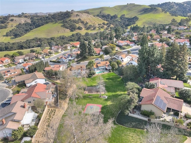 drone / aerial view with a mountain view and a residential view