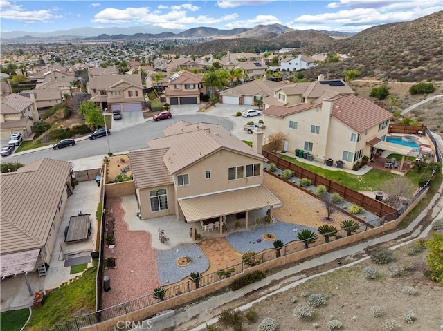 bird's eye view featuring a mountain view and a residential view