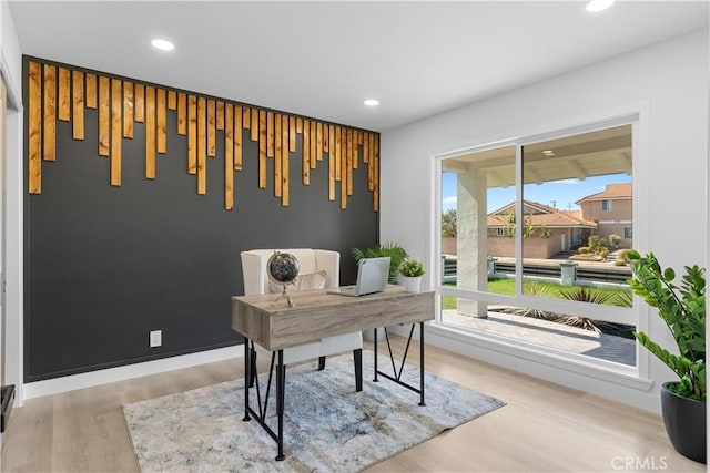 home office featuring light wood-type flooring and recessed lighting