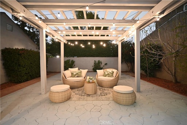 view of patio featuring a fenced backyard, an outdoor living space, and a pergola