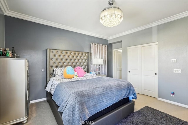 bedroom featuring crown molding, carpet flooring, and baseboards