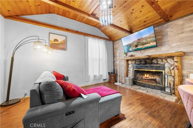 living room featuring wooden ceiling, a fireplace, lofted ceiling with beams, and wood finished floors