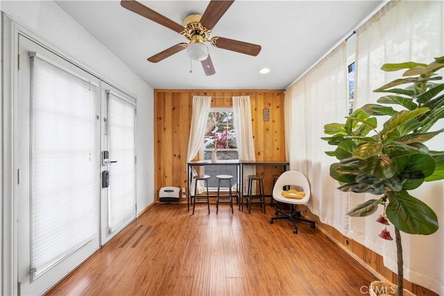 unfurnished room with ceiling fan and wood finished floors