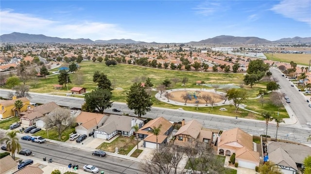 birds eye view of property with a residential view and a mountain view