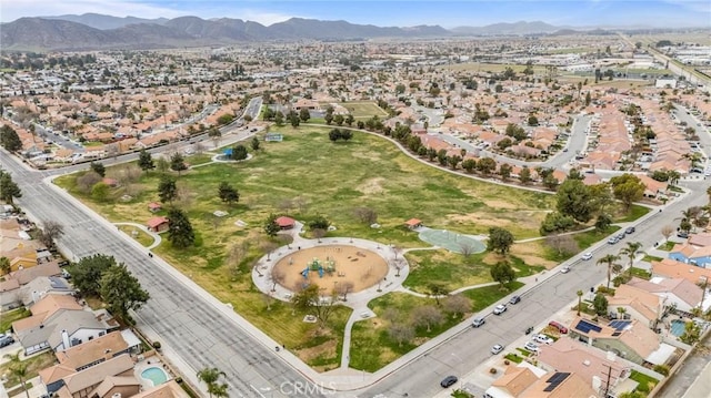 bird's eye view with a residential view and a mountain view