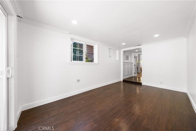 unfurnished room with ornamental molding, recessed lighting, baseboards, and wood finished floors