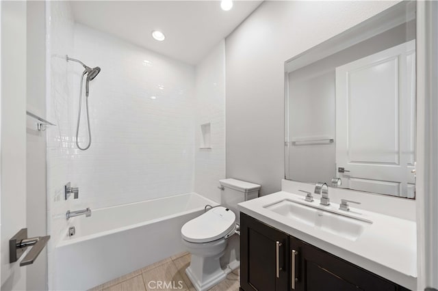 bathroom featuring toilet, recessed lighting, bathtub / shower combination, and vanity