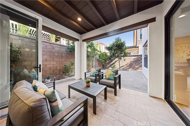 view of patio with a fenced backyard and an outdoor hangout area