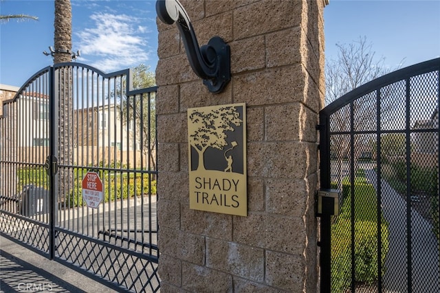 view of gate with fence