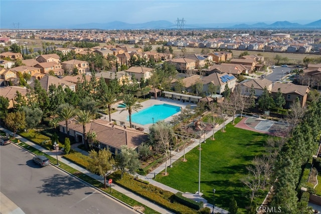 bird's eye view featuring a mountain view and a residential view