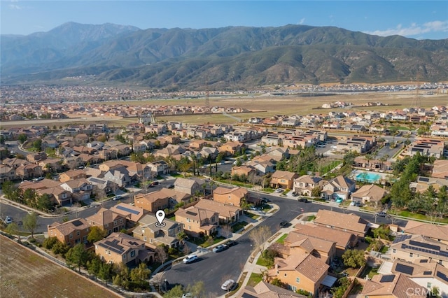 bird's eye view with a residential view and a mountain view