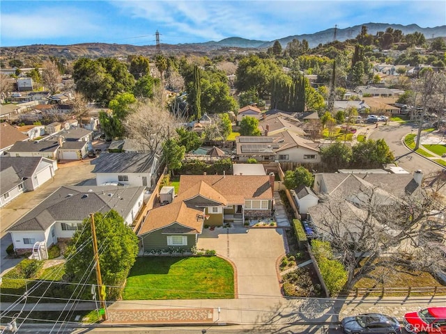 bird's eye view featuring a mountain view and a residential view