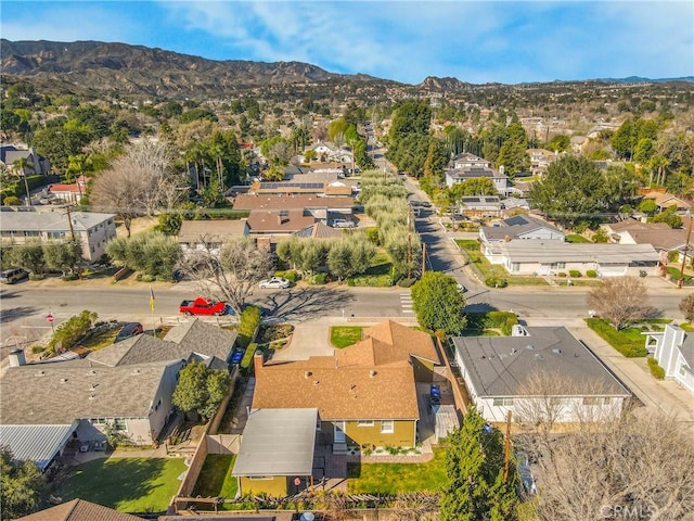 birds eye view of property with a residential view and a mountain view