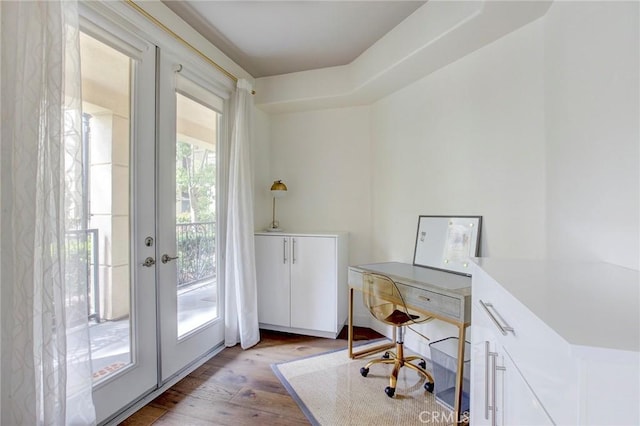 office featuring french doors and wood finished floors