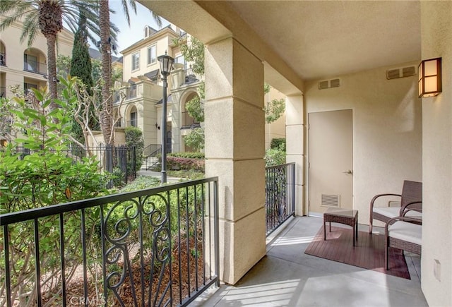 balcony featuring visible vents