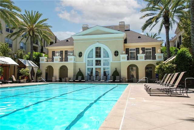 community pool featuring a patio