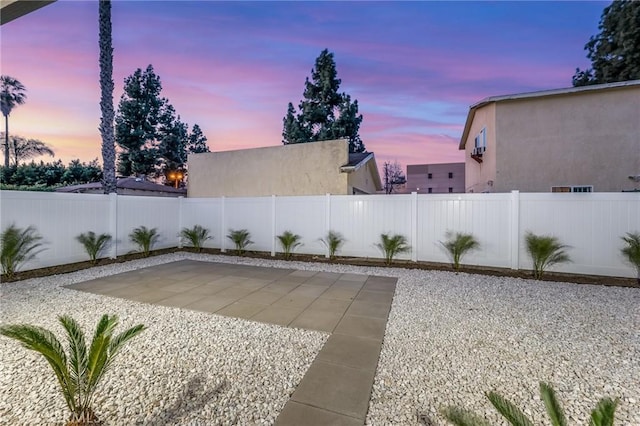 exterior space featuring a fenced backyard