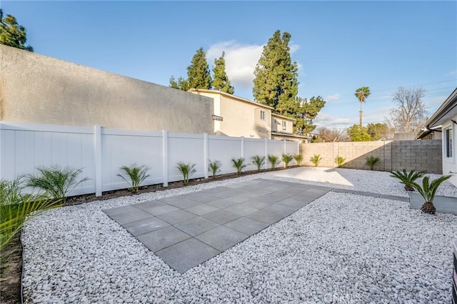 view of patio featuring a fenced backyard