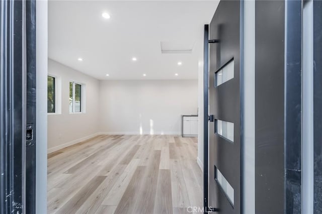 entrance foyer with recessed lighting, baseboards, and light wood-style flooring