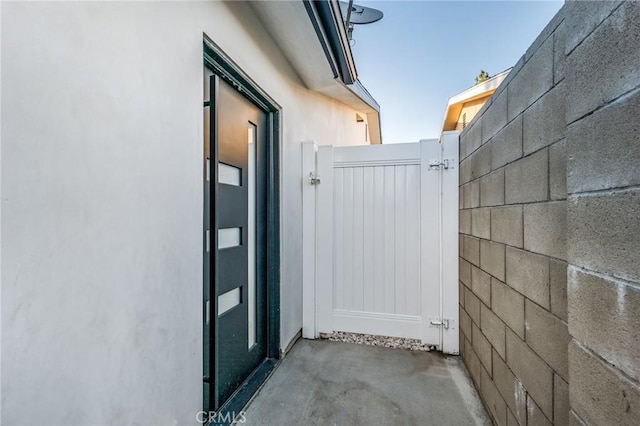 view of gate featuring fence