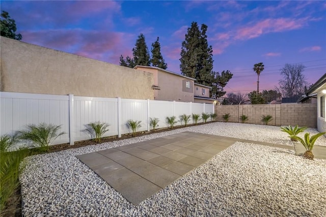 view of patio with a fenced backyard