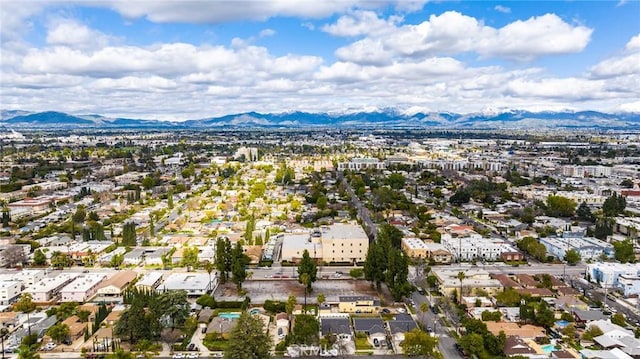 aerial view with a mountain view and a residential view