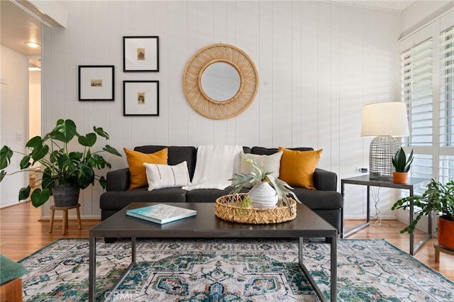 living room featuring plenty of natural light and wood finished floors