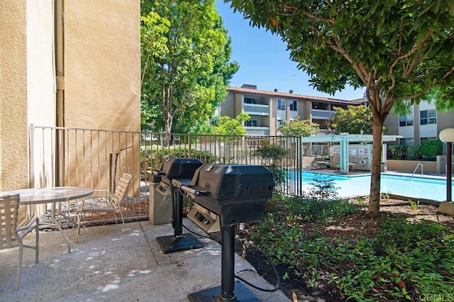 exterior space with a patio and fence