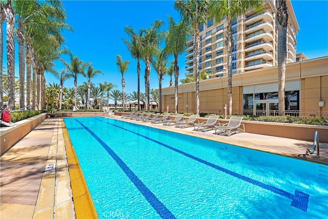 pool with a patio area