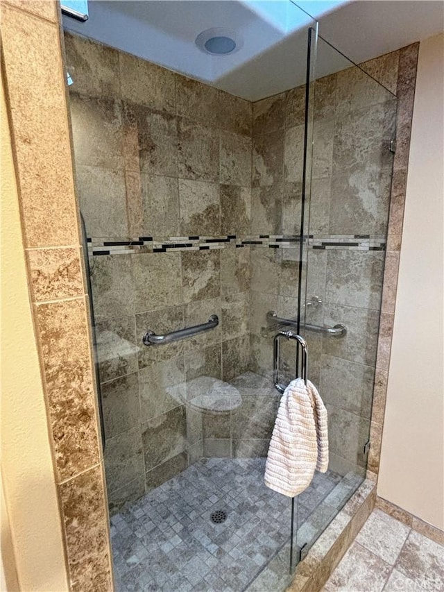 full bathroom with a stall shower