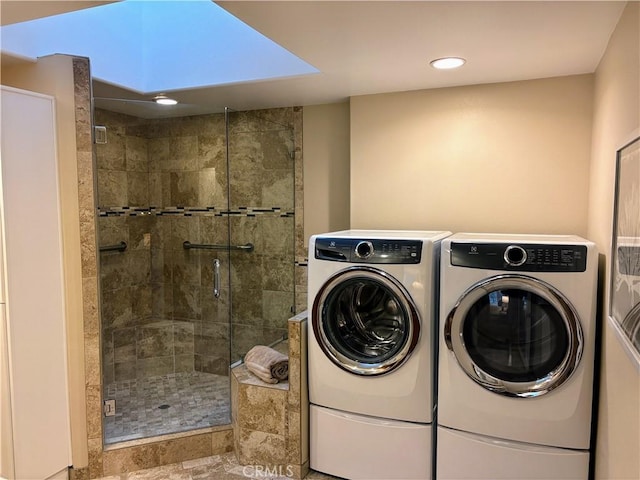 laundry room featuring laundry area, independent washer and dryer, and recessed lighting