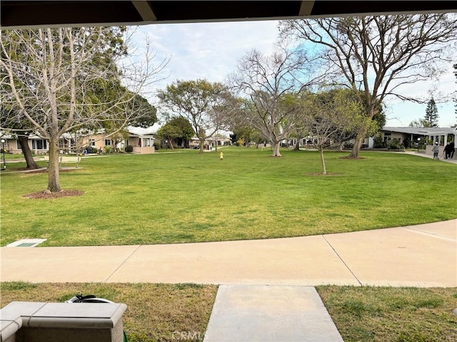 surrounding community with a lawn