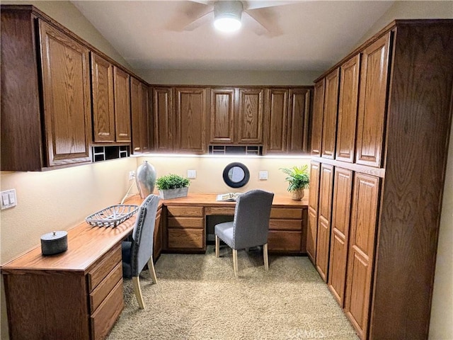 office area featuring built in study area and a ceiling fan