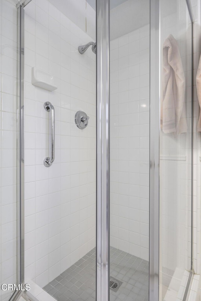 bathroom featuring a stall shower