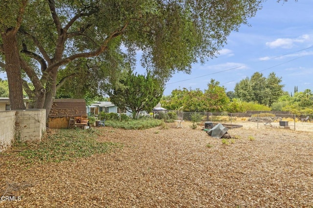 view of yard with fence