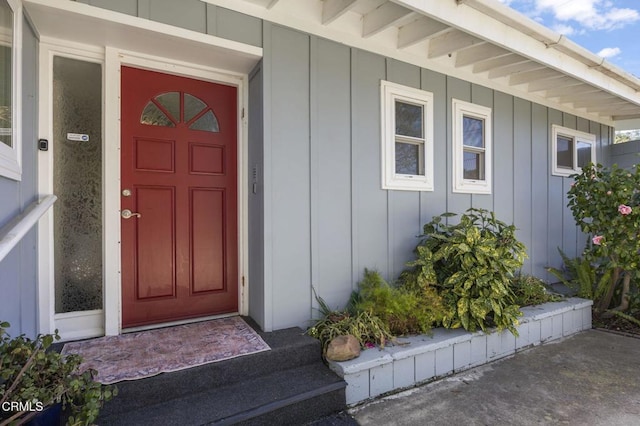 property entrance with board and batten siding