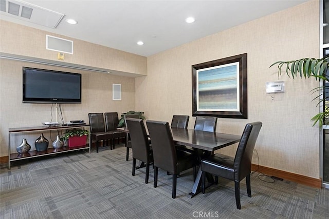 carpeted dining space with wallpapered walls, baseboards, and recessed lighting