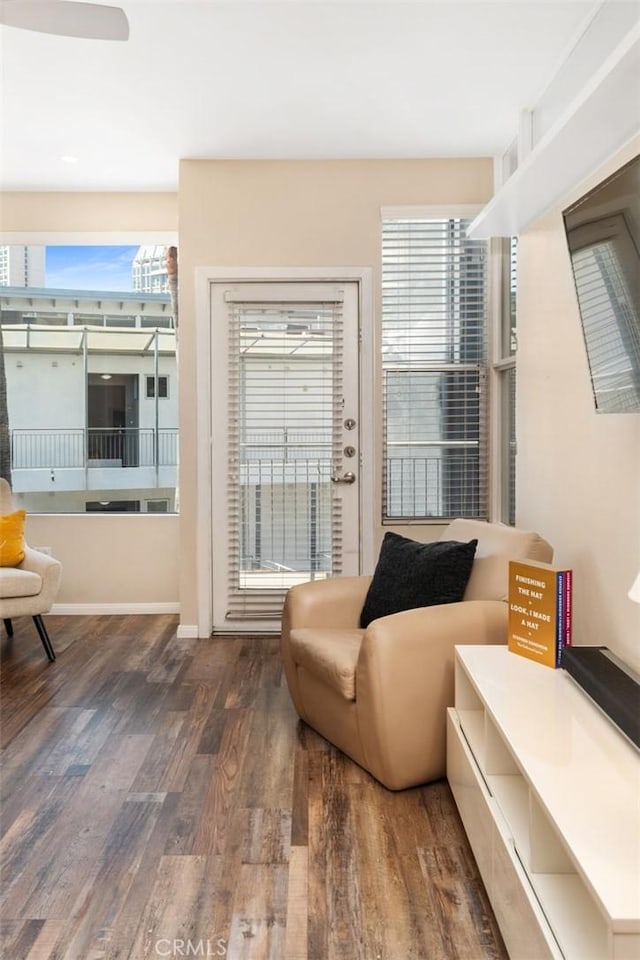 sitting room featuring wood finished floors