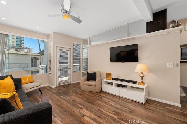 living room featuring recessed lighting, wood finished floors, a ceiling fan, and baseboards