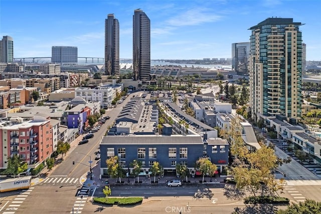 birds eye view of property featuring a city view