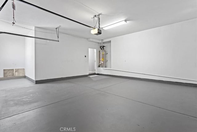 garage with a garage door opener, water heater, and baseboards