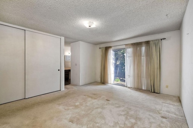 interior space featuring a textured ceiling