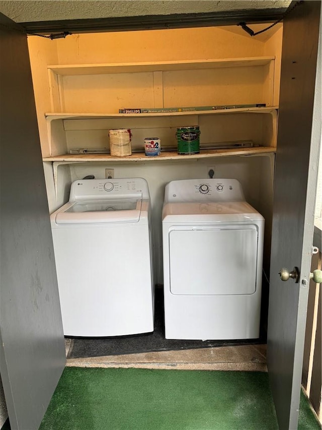 clothes washing area featuring laundry area and independent washer and dryer