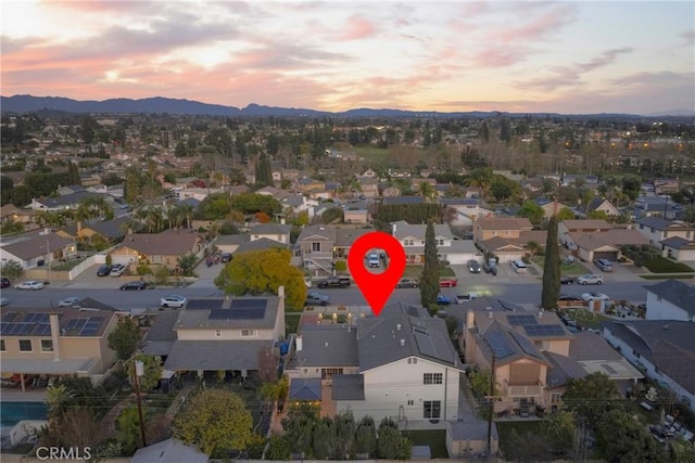 bird's eye view with a residential view and a mountain view