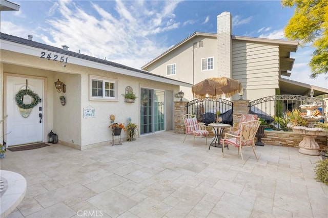 view of patio with fence